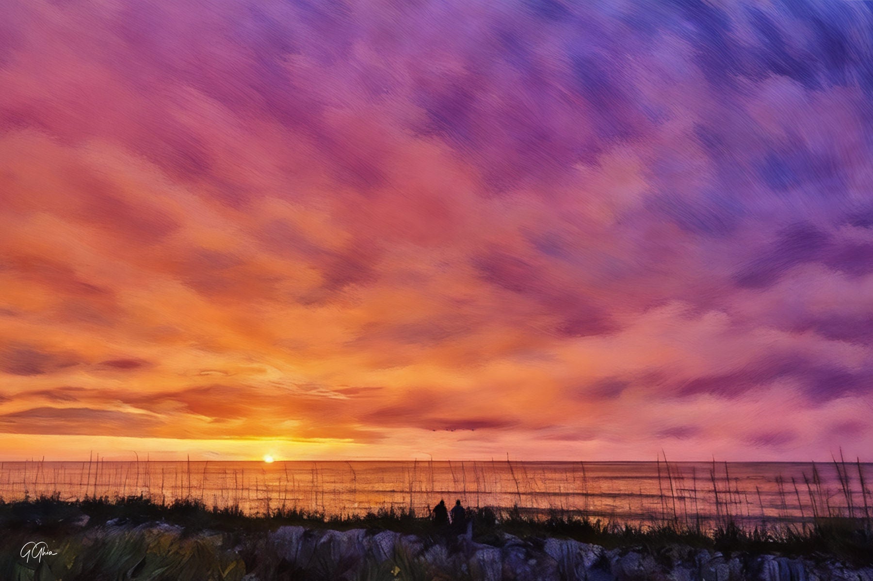 Sunrise at Carolina Beach off Alabama Avenue with light creating a rainbow gradient across the sky over the ocean.